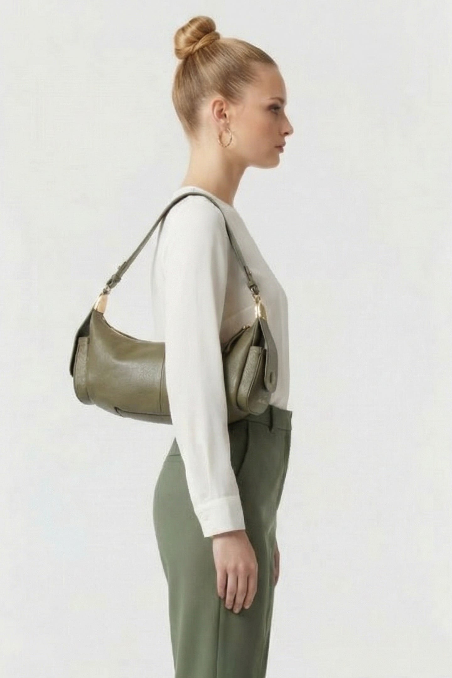 LEATHER SHOULDER BACK WITH POCKETS IN GREEN 1